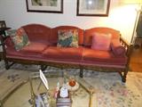 sofa in excellent condition with European styling and carpet