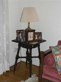 end table with European styling an lamp