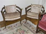2 occasional chairs in neutral colors.