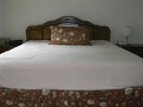 King-size headboard and bedframe - many linens available for king-size bed.