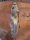 brass corner decoration on gorgeous three drawer cabinet