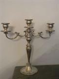 on of two silver candelabras