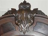 detail on top of headboard of king size bed