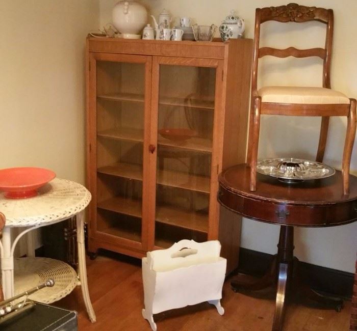 Glass front cabinet, Duncan Phyfe table, old white wicker