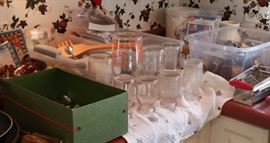 Old milk bottles from dairies in Wheaton, Naperville, and other nearby Illinois towns. Kitchen gadgets and utensils
