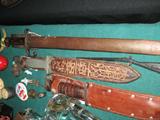 WWII long bayonet in scabbard (great condition)
WWII ANDERSON trench kinife in scabbard