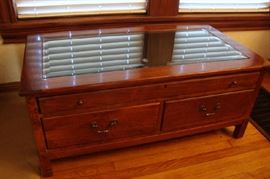 Coffee Table with Beveled Glass Top and Pull out Drawer to display small collectibles.  Very Nice quality by Bob Timberlake
