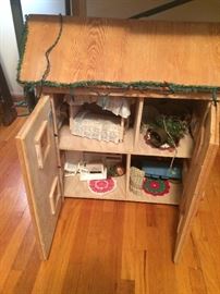 child's doll house with furniture