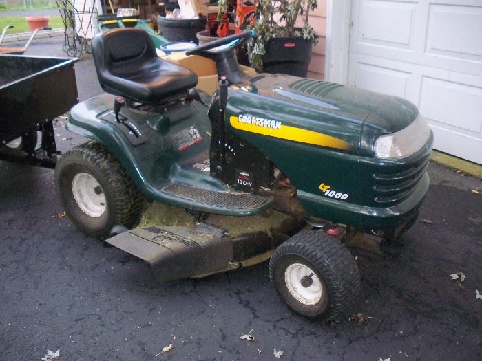 nice craftsman riding mower.....he was using it today