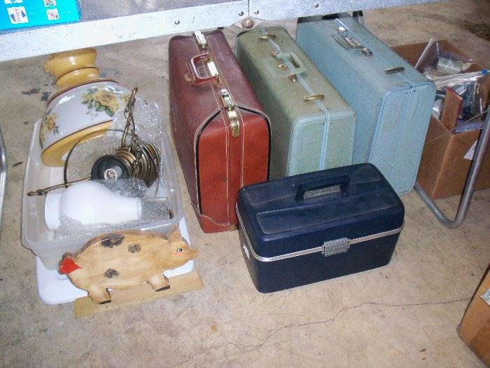 suit cases and light fixture