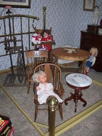 brass bed, antique spinning wheel lamp, hi chair, tables and rockers.  Also dolls