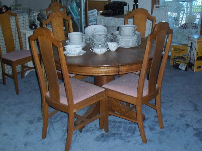 table and 6 chairs and leaves, china set...we will have more china sets