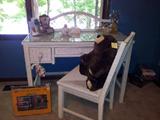 White wicker desk and chair from House of Bedrooms