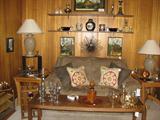 Berkline Reclining love seat accented with great pillows.