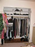 Closet filled with quality Women's clothing, shoes, purses and scarves.