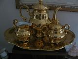 Gold painted 4 piece tea set from Heutschenreuther, signed Muriel Duer, 1951