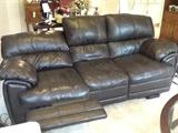 Beautiful brown leather electronic dual reclining sofa in excellent condition