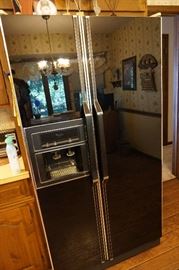 whirlpool side-by-side refrigerator with built in ice maker