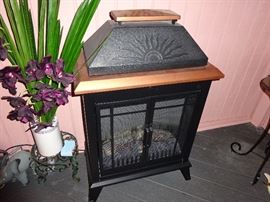 outdoor/indoor fireplace with towel warmer (not a heater)