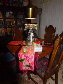 dining table and a cermic komono- Lana Federico sculpture of kimono