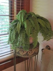 Mosaic tiled plant stand.
