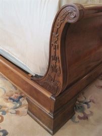 Queen size sleigh bed complete with all the bedding.