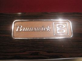 Brunswick pool table with cues and racks. Buy it now for $750. Call 952-261-6461 to schedule an appointment.