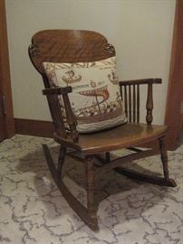 Vintage Rocker with leather seat.