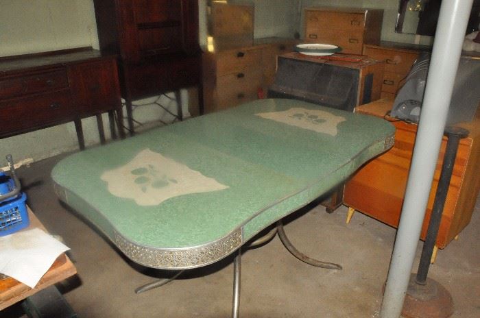 Formica Table with one chair :-(     Plenty of glimmering shiny chrome :-)                                          