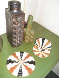 Striped pottery are Jonathan Alder pieces and several pieces of handmade Contemporary Pottery.