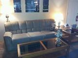 Grey Sofa and Two Contemporary Wood/Glass Side Tables and Coffee Table.
