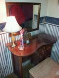 Vintage 40's- 50's Vanity minus the usual skirting.  Framed Mirror.  Small lamps.