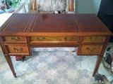 Sligh Lowery Mahogany Desk with Leather Top and Gold markings.  In wonderful condition.