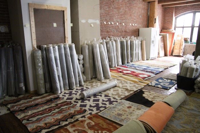 350 brand new area rugs - sizes include: 5ft 3in X 8ft 3in, 2ft 9in X 14ft, 2ft 9in X 18ft, 3ft 9in X 5ft 9in, 2ft X 3ft, 8ft round rugs, 7ft 6in X 9ft 6in.