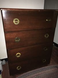 Nice, heavy 4-drawer chest with Asian-theme brass pulls.