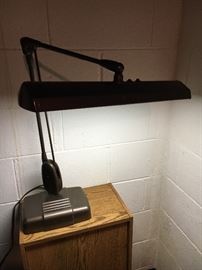 Heavy vintage industrial-style articulating lamp.