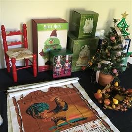 Christmas décor in boxes, vintage linen calendar towels.