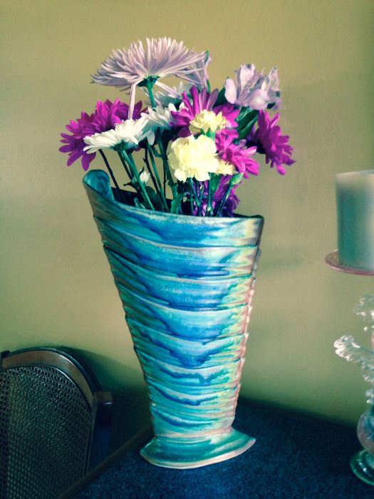 Doug Dacey hand crafted ceramic vase. 16"x10"x5" Valued at $400. Beginning bid starts at $200.