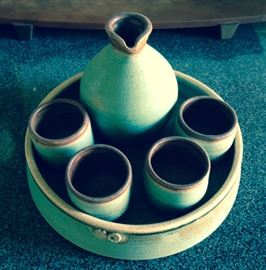 Sake set by Two trees pottery. Value is $120. Starting bid $60.