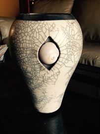 Raku vase by Vilas North Carolina artist and current president of the Southern Highland Craft Guild, Lynn Jenkins 9"x5" Valued at $150. Starting bid $75.