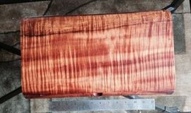 Jewelry box with drawers made by Ray Jones of Asheville, NC The wood is curly koa.  Valued at $900. They can be seen at Ray Jones wood boxes dot com. Item number BX-19 Beginning bid $450.