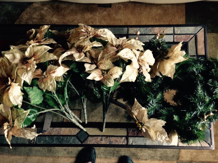 Faux Poinsettia flowers for Christmas decorating and some faux garland. Make me an offer.