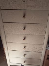 7 drawer chest in Off white cracked paint @ 300.00