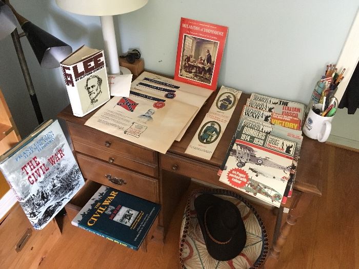 Civil war collection of books, and reproduction uniforms, signs and history of Gettysburg