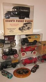 JIM BEAM AUTO DECANTERS IN CUSTOM LUCITE DISPLAY BOXES.  JUST A FEW OF MANY AVAILABLE