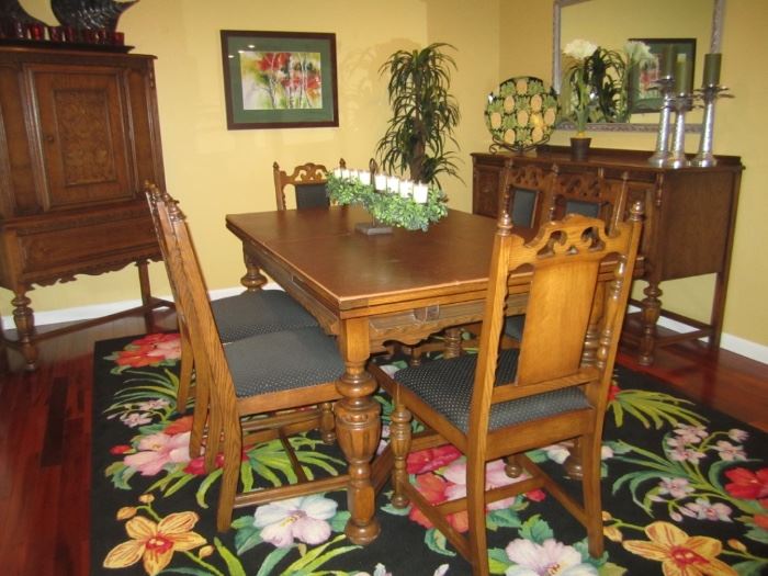 ANTIQUE  JACOBEAN STYLE OAK DINING ROOM TABLE WITH PULL OUT END LEAVES AND 6 CHAIRS, BUFFET AND HUTCH FROM THE LATIN SCHOOL IN ST. LOUIS