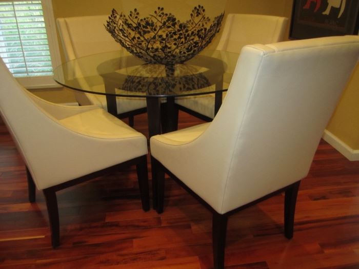 GLASS TOP TABLE FROM CRATE AND BARREL AND 4 CHAIRS FROM ARHAUS   MAY SELL 4 CHAIRS ALONE AND TABLE BY ITSELF