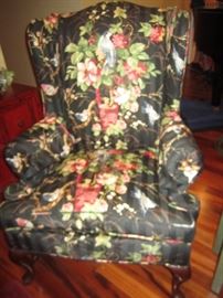 PAIR OF WING BACK CHAIRS IN BLACK FLORAL AND BIRD PATTERN 