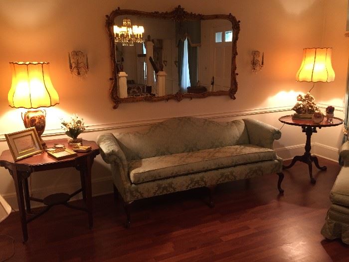 Rolled Arm Sofa.  Many tables throughout the house.  Awesome Lamps, Ornate Mirrors and décor.
