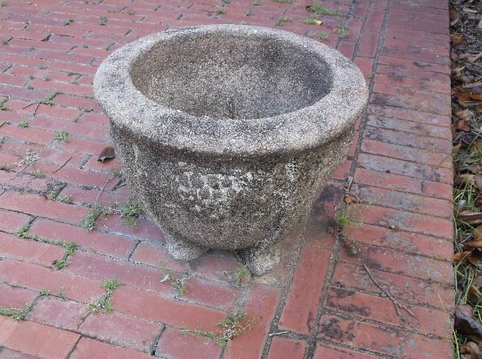 One of several concrete flower pots